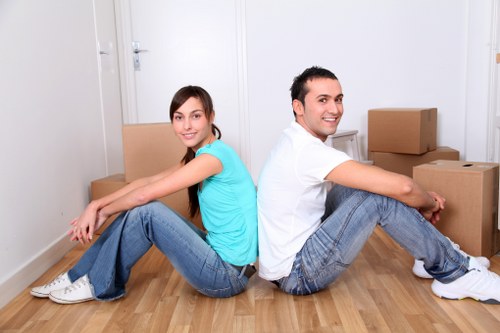 Local team collecting bulky furniture in a London street