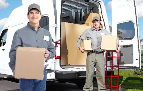 Household items and boxes organised for a local removals service in Islington