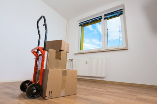 Moving supplies and labeled boxes ready for an Islington house relocation